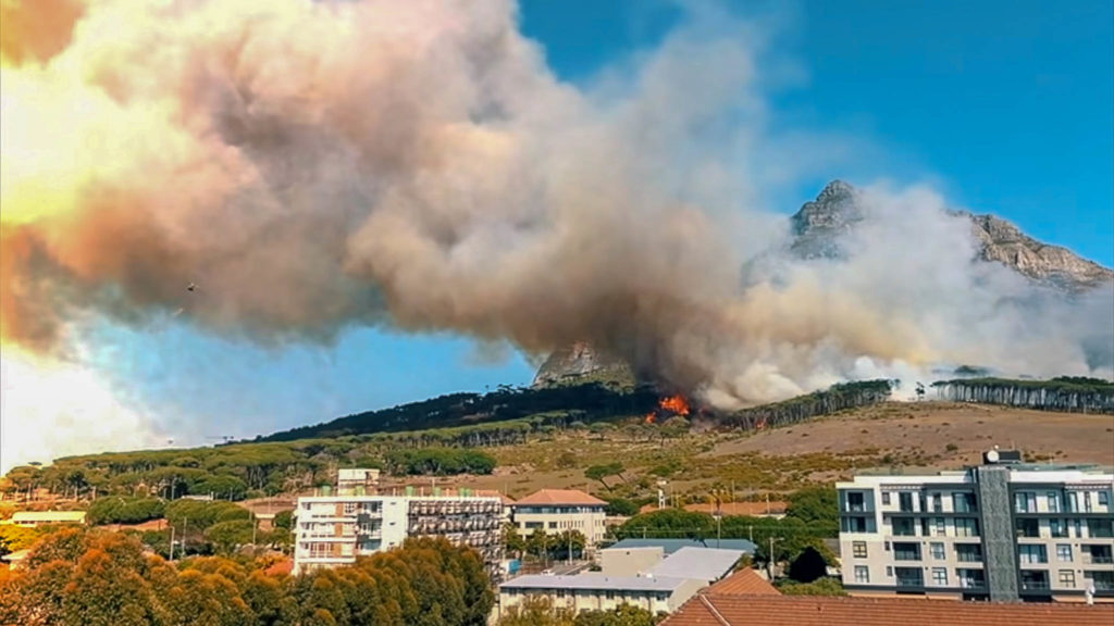 A wideview of the Table Mountain fire with huge clouds of smoke